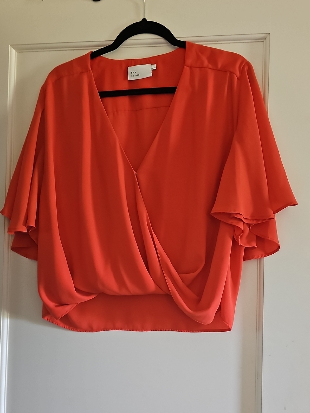 the room Vibrant Orange Surplice Flutter Sleeve Blouse